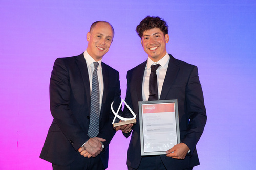 Axl Lopez accepting the Digital Innovation Project of the Year award on behalf of Balfour Beatty